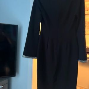 Calvin Klein size 4 black holiday dress with embellished sleeves